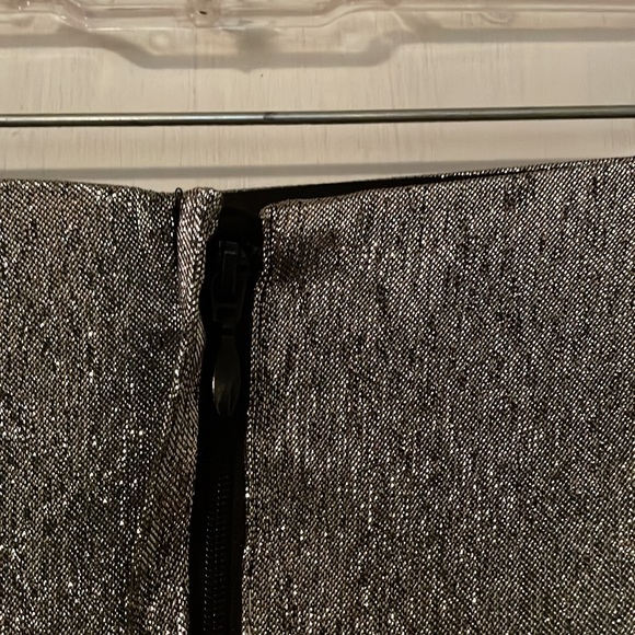 H&M silver shiny mini skirt. Size8 I put it with a shirt I’m selling too see 👀 - Picture 5 of 11